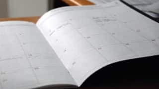 Paper calendar open on desk