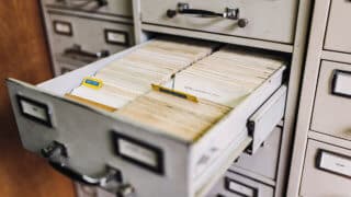 open filing cabinet drawer containing index cards